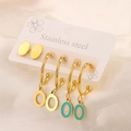Close-up of titanium steel earring set with gold finish and colorful enamel charms - 3 Pairs Tricolor Enamel Oval Set