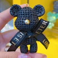 Black resin bear keychain with knitted texture, gold nose, and 'LOVE' printed ribbon - Single Doll / Black