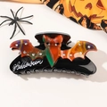 Detail of Halloween bat hair claw clip with rhinestones and orange lettering - Large Bat Style (PVC Half Round Large Bat-Orange Red)