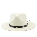 Detailed texture of beige woven straw hat with star-studded black leather band - Cream