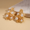 Detail of 18K gold-plated floral earrings with textured petals and inlaid pearls - Flower Design (Gold Real Gold Plated) / Gold