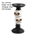 Gothic double stacked skull candle holder made of resin in 18x9x9cm white and black finish - White (Skull Candlestick)
