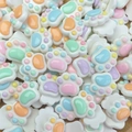 Macro shot of colorful resin cat paw charms for DIY nail art and craft decoration - Colorful Cat Claw