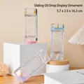 Clessidra liquida a cartone animato con scivolo e gocce d'olio colorate per relax - Gelato - Scivolo