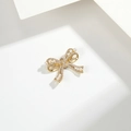 Elegant 18K gold bow pendant with white pearls and sparkling cubic zirconia stones - Pearl Rhinestone Bow (PJ0047) / Gold