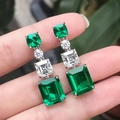 Boucles d'oreilles pendantes en zircon vert émeraude avec pierres claires en argent - Vert