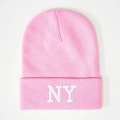 Pink knit beanie with white NY embroidery featuring a ribbed texture on white background - One Size / Pink