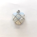 Opal heart pendant with silver wire wrap design and delicate light blue shimmer - Opalite