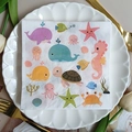 Square party napkins featuring cartoon marine animals including whales and turtles - Ocean Cartoon (1099)
