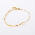 Minimalist gold bangle chain bracelet with a single round zircon and adjustable lobster clasp - Gold