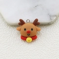 Detailed close-up of a resin reindeer Christmas pendant with a red collar and gold bell - Christmas Reindeer