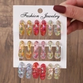 Detailed close-up of colorful resin C-shape hoop earring set with woven textures - 9 Pairs C-Shaped Translucent Iridescent Woven Set(E0066-1)