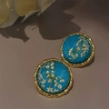 Blue amber resin earrings with white dried flowers and 18K matte gold gear-shaped borders - Lake Blue Dandelion