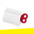 Manual white toothpaste squeezer with a red rotary knob for efficient tube compression - Bulk/Loose Packaging / Red
