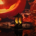 Detail of Halloween witch silhouette lantern with warm yellow light on a dark surface - Pumpkin Witch Lantern