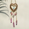 Golden heart suncatcher with pink crystals and butterflies hanging on a white wall - Purple Beads + Rose Butterfly + Pink Crystal