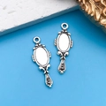 Pair of vintage silver mirror charms with intricate floral patterns for DIY jewelry - Tool Mirror 9.5x27mm