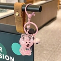 Pink transparent liquid glitter bear keychain with bell and internal letter charms - Pink Sitting Letter Bear