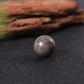 Polished natural red jasper stone sphere 16mm on a black stand with rich texture - Red Grass Flower Stone