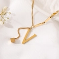Golden titanium steel V-letter pendant necklace with cube charm on white fabric - Gold Initial V (8847)