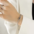 Silver chain bracelet with rectangular black stone and S925 engraving on model wrist - Steel Color Black Zircon Bracelet
