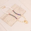 Detail of bohemian polymer clay necklace with gold heart pendant and pearls - Camouflage #4