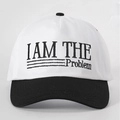 Close-up of I AM THE Problem embroidery on two-tone cotton twill baseball cap - Adjustable / White and Black Splicing