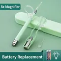 Close-up of lighted earwax removal kit with 8x magnifying glass and silicone tips - Luminous 7-Piece Set / Family Pack / Mint Green