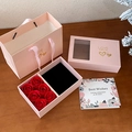 Pink gift box set with six red soap roses, gift bag, and card on a wooden surface - Jewelry Box Set / Pink
