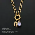 14K gold plated stainless steel necklace featuring crystal and letter n charm - Lowercase n