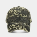 Detailed close-up of a vintage washed camouflage baseball cap with leopard print texture - Adjustable / Green