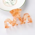 Pinza para el cabello ondulada en ámbar naranja jaspeado de resina translúcida - Pinza Ondulada / Naranja Jaspeado