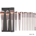 Professional 14-piece champagne gold makeup brush set with a black pebbled leather case - 14Pcs Champagne Makeup Brushes with Black Bag