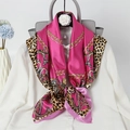 Pink silk square scarf with leopard print and gold chain detail on white shirt - Rose Red Chain