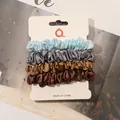 Detailed view of four satin silk scrunchies in blue, grey, gold and brown set - Blue-grey Gold Coffee