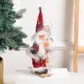Standing 18-inch Santa Claus figurine with skis and poles on a white display stand - 20cm*5cm / Skiing Santa