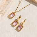 Set di gioielli dorati con cristalli rosa quadrati completo di collana ed orecchini a cerchio - Oro Rosa