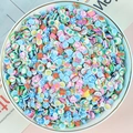Mix di fette di argilla polimerica natalizia con Babbo Natale e fiocchi di neve - Natale / Confezione da 100g