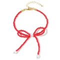 Elegante bracciale con perline rosse placcato oro 18K con fiocco e perle bianche - Fiocco in Grani Rossi + Catena di Estensione