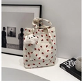 Corduroy bucket bag in cream with red strawberry print and plush white charm accessory - White with Pendant