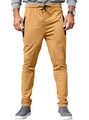 Detalle de los pantalones deportivos caqui con bolsillos de cremallera y corte ergonómico - S / Caqui