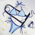 Two-piece color block bikini with light blue fabric and dark blue strap accents - Light Blue