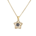 Gold plated flower pendant necklace with blue gemstone and zircon on white background - Star Pendant / Blue