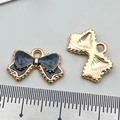 Pink enamel bow tie alloy pendant for DIY jewelry making in dark blue and gold finish - Black Bow