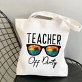 White canvas tote bag featuring Teacher Off Duty print with sunset beach sunglasses - Teacher Off Duty
