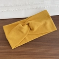 Minimalist yellow ribbed knit crossover headband for yoga and daily sports use - Turmeric
