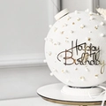Detail of white birthday cake with gold foil flakes, pearls and Happy Birthday acrylic topper - Design No.4 / Gold