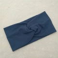 Elastic knitted cross headband for sports in solid blue with ribbed texture finish - Haze Blue