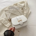 Elegant white leather crossbody bag with gold rectangular buckle and minimalist flap design - White