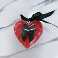 Heart-shaped powder puff in red velvet with a black ribbon bow in a clear plastic box - Heart Transparent Box/1pc / Red
